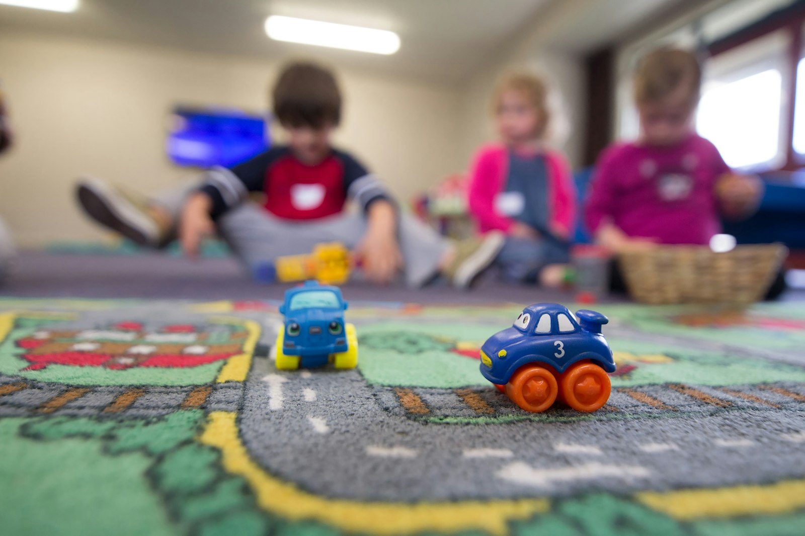 Young children playing together in a preschool classroom