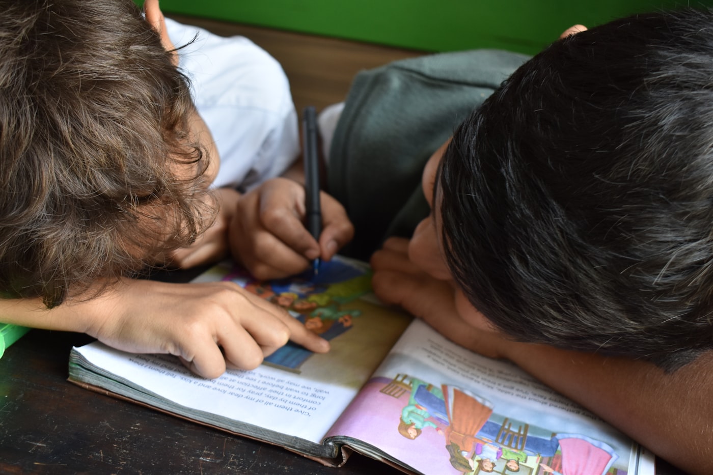 Child focused on a classroom learning activity